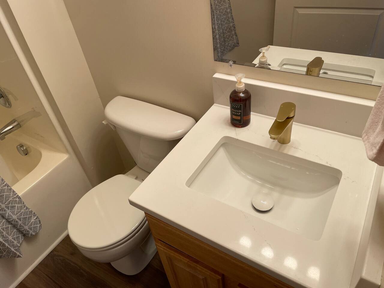 Full Bath Off Main Living Area Quartz Counters